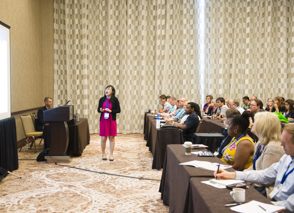 A woman presents at NISOD's 2019 conference. 