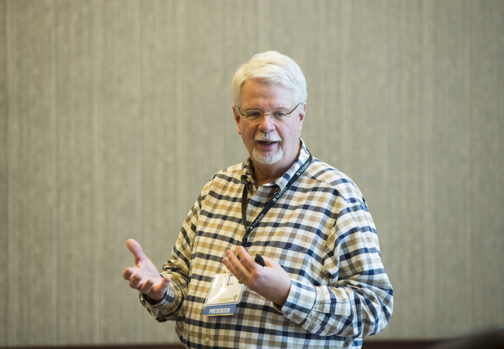An older man presents at NISOD's 2019 conference.