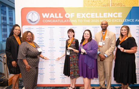 2025EA5 Photo showing 2025 Excellence Awards Recipients in front of the Wall of Excellence